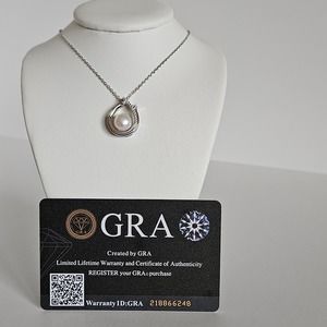 Enchanting Elegance: Sterling Silver Necklace, Pear-Shaped Pendant with Pearl